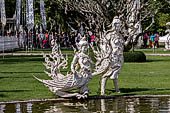 Famous Thailand temple or white temple, Wat Rong Khun,at Chiang Rai province, northern Thailand. 